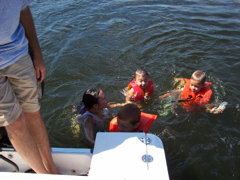 Boys swimming in the Saco river